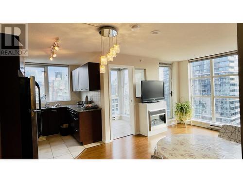 2304 1155 Seymour Street, Vancouver, BC - Indoor Photo Showing Other Room With Fireplace