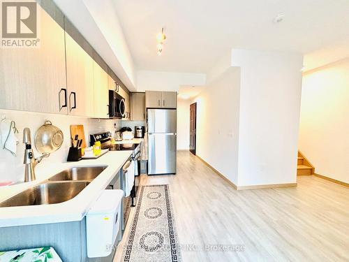 308 - 3425 Sheppard Avenue E, Toronto, ON - Indoor Photo Showing Kitchen With Double Sink