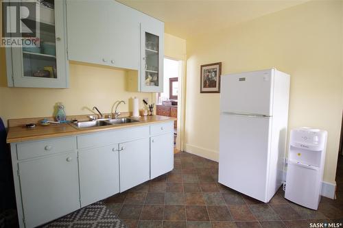 115 5Th Avenue N, Wapella, SK - Indoor Photo Showing Kitchen With Double Sink