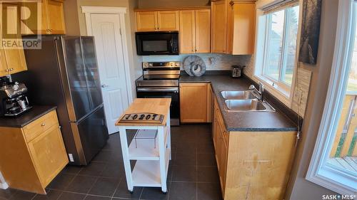 10207 Ross Crescent, North Battleford, SK - Indoor Photo Showing Kitchen With Double Sink