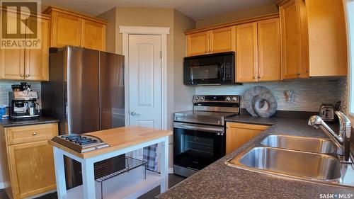 10207 Ross Crescent, North Battleford, SK - Indoor Photo Showing Kitchen With Double Sink