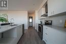 15 Glebe Street Unit# 1301, Cambridge, ON  - Indoor Photo Showing Kitchen With Stainless Steel Kitchen With Double Sink 