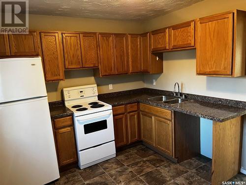 138 Wellington Avenue, Yorkton, SK - Indoor Photo Showing Kitchen With Double Sink