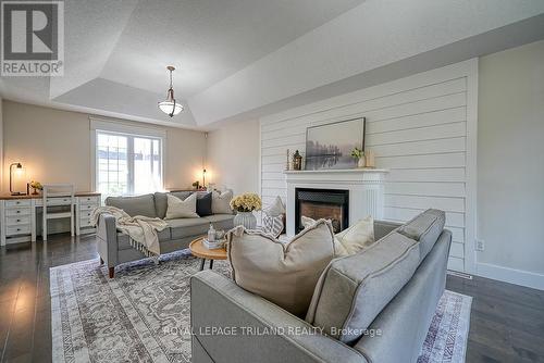 21 Oriole Crescent, Woodstock, ON - Indoor Photo Showing Living Room With Fireplace