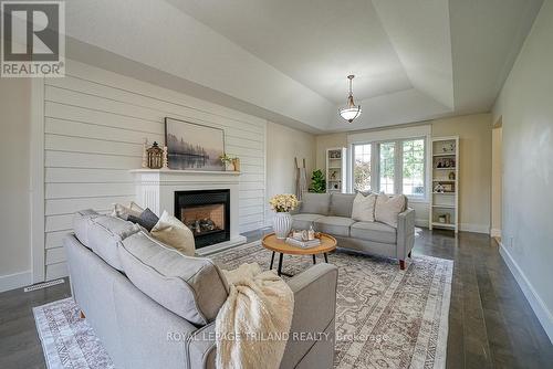 21 Oriole Crescent, Woodstock, ON - Indoor Photo Showing Living Room With Fireplace