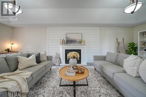 21 Oriole Crescent, Woodstock, ON - Indoor Photo Showing Living Room With Fireplace