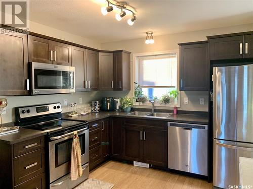 218 Veltkamp Lane, Saskatoon, SK - Indoor Photo Showing Kitchen With Double Sink