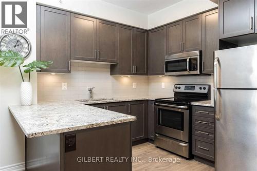 907 - 9255 Jane Street, Vaughan, ON - Indoor Photo Showing Kitchen With Upgraded Kitchen