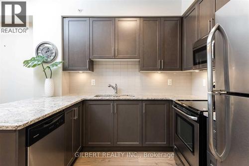 907 - 9255 Jane Street, Vaughan, ON - Indoor Photo Showing Kitchen With Double Sink With Upgraded Kitchen