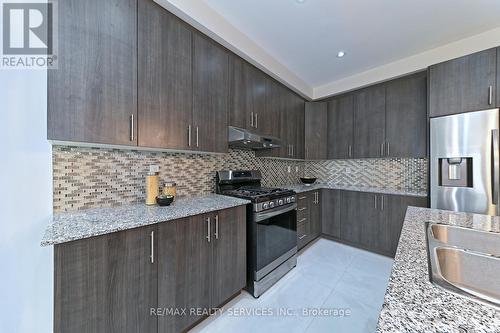 56 Royal Fern Crescent, Caledon, ON - Indoor Photo Showing Kitchen With Stainless Steel Kitchen With Double Sink With Upgraded Kitchen