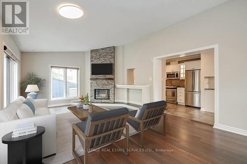 411 Trafalgar Road, Oakville, ON - Indoor Photo Showing Living Room With Fireplace