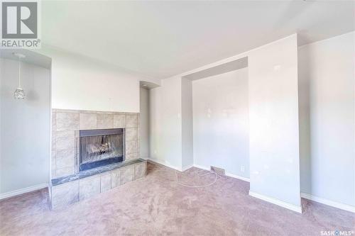 622 31St Street W, Saskatoon, SK - Indoor Photo Showing Living Room With Fireplace