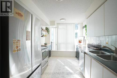 203 - 24 Wellesley Street W, Toronto, ON - Indoor Photo Showing Kitchen With Double Sink