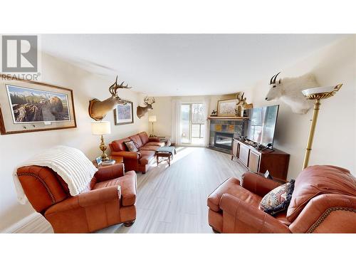 4874 Stanley Street Unit# 204, Radium Hot Springs, BC - Indoor Photo Showing Living Room With Fireplace