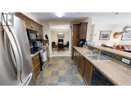 4874 Stanley Street Unit# 204, Radium Hot Springs, BC - Indoor Photo Showing Kitchen With Double Sink