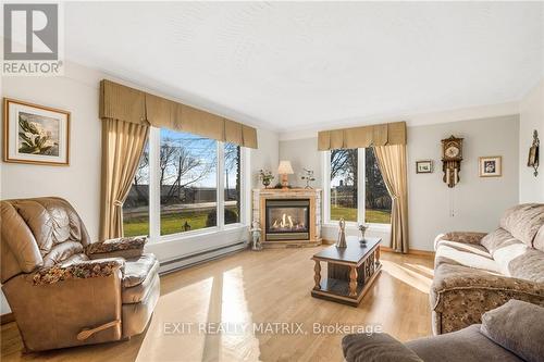 590 Blue Corner Road, Alfred And Plantagenet, ON - Indoor Photo Showing Living Room With Fireplace