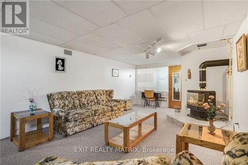 590 Blue Corner Road, Alfred And Plantagenet, ON - Indoor Photo Showing Living Room With Fireplace