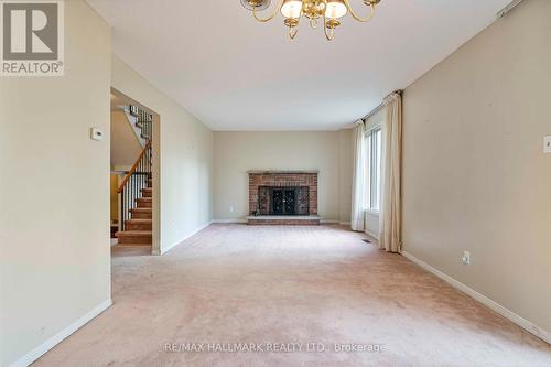 101 Bushmills Square, Toronto, ON - Indoor Photo Showing Living Room With Fireplace