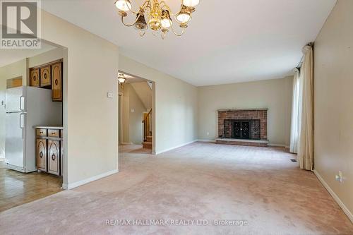 101 Bushmills Square, Toronto, ON - Indoor Photo Showing Living Room With Fireplace