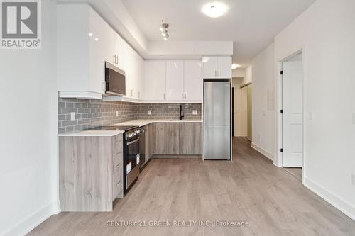 535 - 2343 Khalsa Gate, Oakville, ON - Indoor Photo Showing Kitchen With Upgraded Kitchen