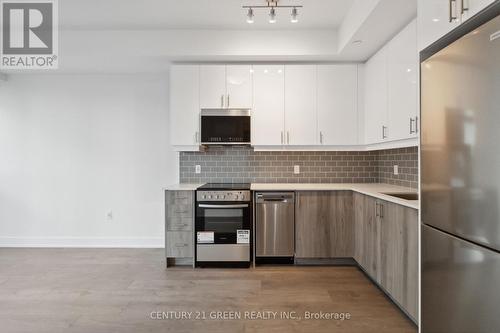 535 - 2343 Khalsa Gate, Oakville, ON - Indoor Photo Showing Kitchen With Upgraded Kitchen