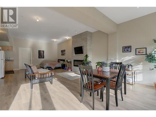 12840 Stillwater Court Unit# 8, Lake Country, BC - Indoor Photo Showing Dining Room With Fireplace