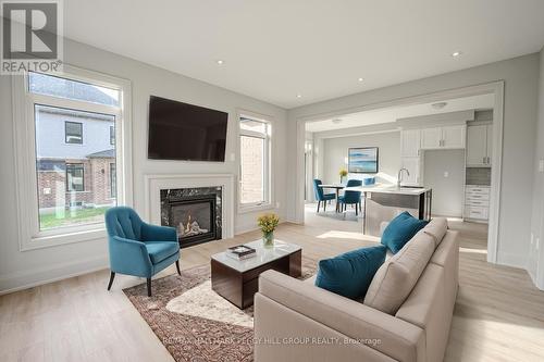 17 Amsterdam Drive, Barrie, ON - Indoor Photo Showing Living Room With Fireplace