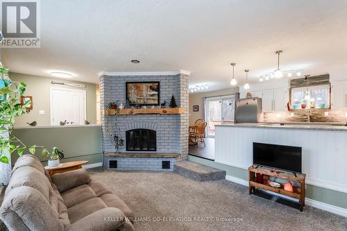 15 Mundy Avenue, Tiny, ON - Indoor Photo Showing Living Room With Fireplace