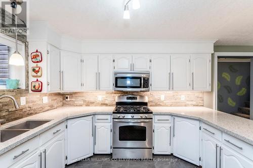 15 Mundy Avenue, Tiny, ON - Indoor Photo Showing Kitchen With Double Sink