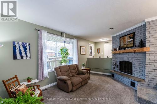 15 Mundy Avenue, Tiny, ON - Indoor Photo Showing Living Room With Fireplace