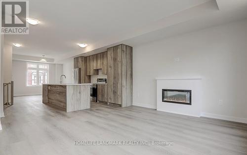 1345 Kobzar Drive, Oakville, ON - Indoor Photo Showing Living Room With Fireplace