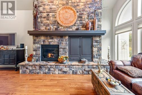 4345 Gallaghers Fairway S, Kelowna, BC - Indoor Photo Showing Living Room With Fireplace