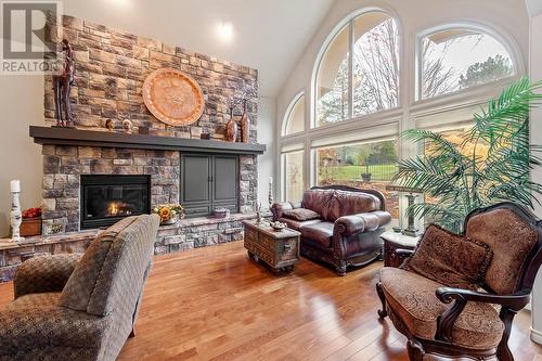 4345 Gallaghers Fairway S, Kelowna, BC - Indoor Photo Showing Living Room With Fireplace