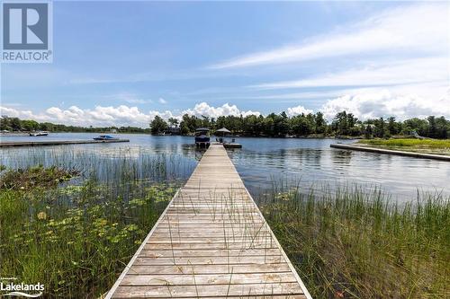 Dock area with a water view - 68 Wolverine Beach Rd, Port Severn, ON - Outdoor With Body Of Water With View