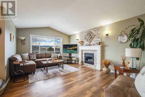 863 Mt Grady Place, Vernon, BC - Indoor Photo Showing Living Room With Fireplace