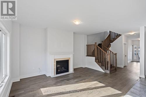 22 Ballinger Way, Uxbridge, ON - Indoor Photo Showing Other Room With Fireplace