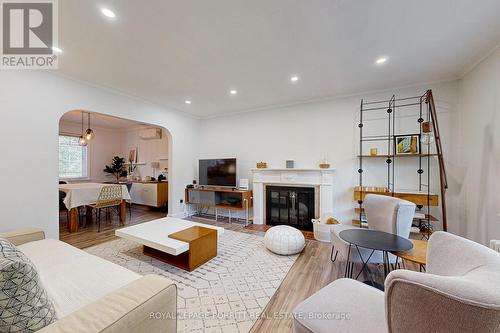 110 Prince Edward Drive S, Toronto, ON - Indoor Photo Showing Living Room With Fireplace