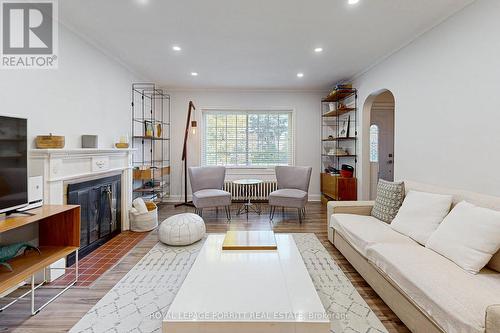 110 Prince Edward Drive S, Toronto, ON - Indoor Photo Showing Living Room With Fireplace