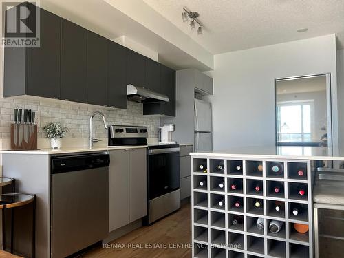 A703 - 3210 Dakota Common, Burlington, ON - Indoor Photo Showing Kitchen