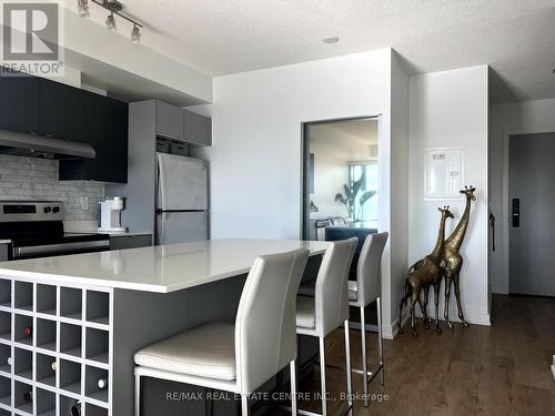 A703 - 3210 Dakota Common, Burlington, ON - Indoor Photo Showing Kitchen