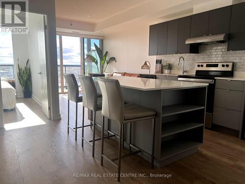 A703 - 3210 Dakota Common, Burlington, ON - Indoor Photo Showing Kitchen With Upgraded Kitchen