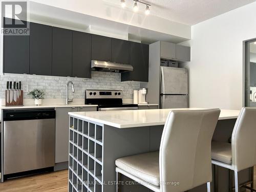 A703 - 3210 Dakota Common, Burlington, ON - Indoor Photo Showing Kitchen With Upgraded Kitchen