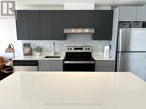 A703 - 3210 Dakota Common, Burlington, ON - Indoor Photo Showing Kitchen With Upgraded Kitchen