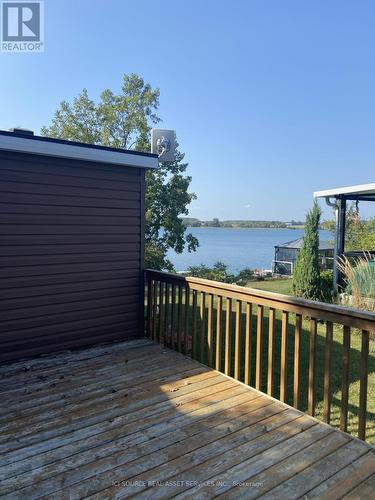 Cbl054 - 486 County Road 18, Prince Edward County, ON - Outdoor With Body Of Water With Deck Patio Veranda