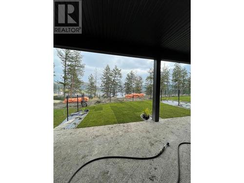 Lower fully covered patio has 220v rough in for a hot tub. - 2835 Canyon Crest Drive Unit# 2, West Kelowna, BC - Outdoor