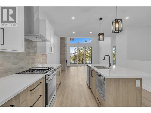 Tall ceilings & open concept layout - 2835 Canyon Crest Drive Unit# 2, West Kelowna, BC - Indoor Photo Showing Kitchen With Double Sink With Upgraded Kitchen