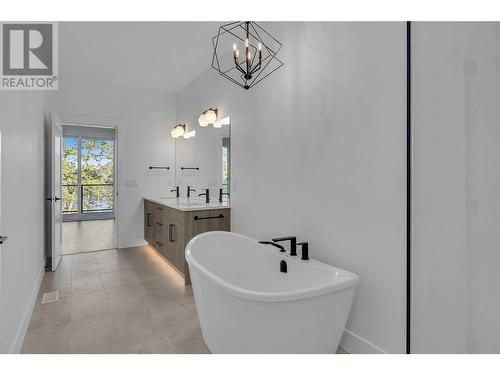 Under-cabinet lighting - 2835 Canyon Crest Drive Unit# 2, West Kelowna, BC - Indoor Photo Showing Bathroom