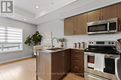 16C - 1430 Highland Road W, Kitchener, ON - Indoor Photo Showing Kitchen With Stainless Steel Kitchen With Double Sink