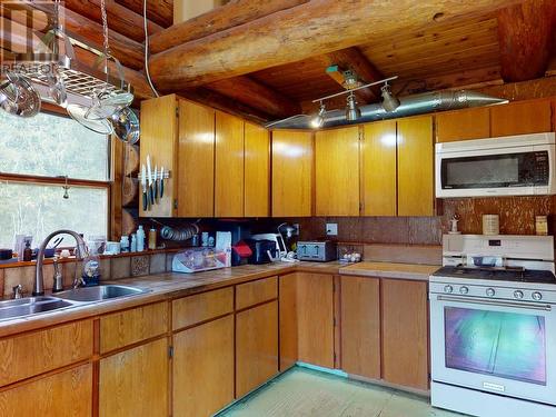 6594 Shelter Point Road, Texada Island, BC - Indoor Photo Showing Kitchen With Double Sink