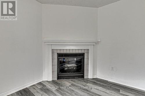 40 - 1990 Wavell Street, London, ON - Indoor Photo Showing Living Room With Fireplace